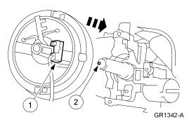 3. Press at the six, twelve and three o'clock positions to seat the air bag sliding contact. 4. Rotate the wiring and secure into two wire clips. 5. Connect the two electrical connectors.