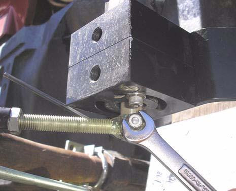 Attaching and Adjusting Wheel Angle Sensor Linkage Rods 2. Ensure a flat washer is placed under the screw head when attaching the linkage rod to the sensor shaft. See Figure 3-17.