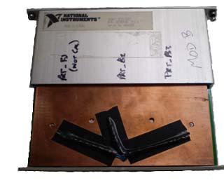 80 Figure 4-8 shows two views of an open SCXI-1303 module with the large copper spreader plate attached.