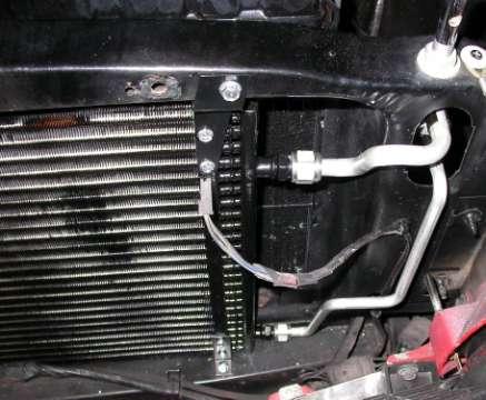 radiator support. Attach using (2) #14 x ¾ tek washer head screws.
