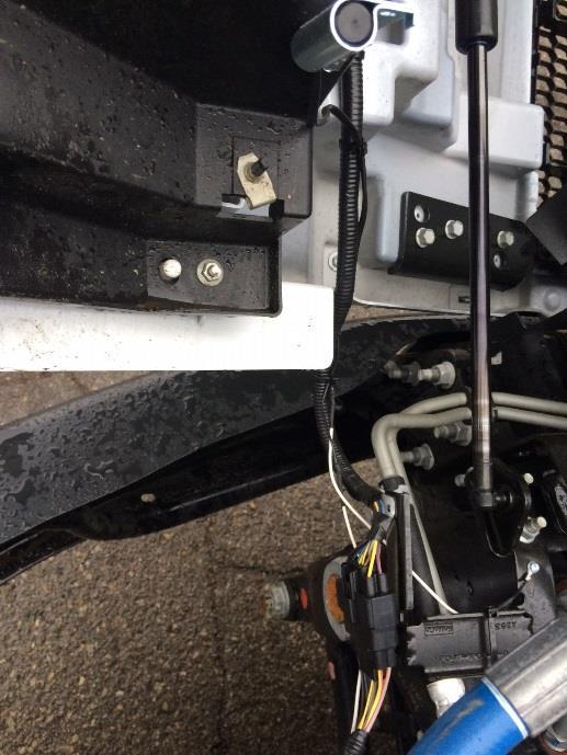 Installation (continued) ROUSH CleanTech Liquid Propane Autogas Fuel System: Ford F-650/750 0. Secure hood open switch ground eyelet to bracket outlined below.