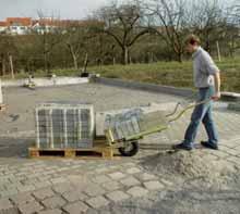paving and thanks to low weight (only 68 kg) and supporting wheel and thereby relieving material transport.