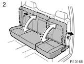 CAUTION Head restraints 2. Raise the bottom cushion while pushing the lock release lever.
