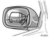 Outside rear view mirrors Power rear view mirror control CAUTION Do not adjust the mirror while the vehicle is moving.