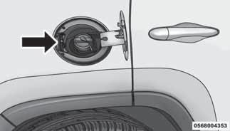 2. Open the fuel filler door, and remove the fuel filler cap. 330 Fuel Filler Door Release Switch Fuel Filler Cap (Gas Cap) In certain cold conditions, ice may prevent the fuel door from opening.