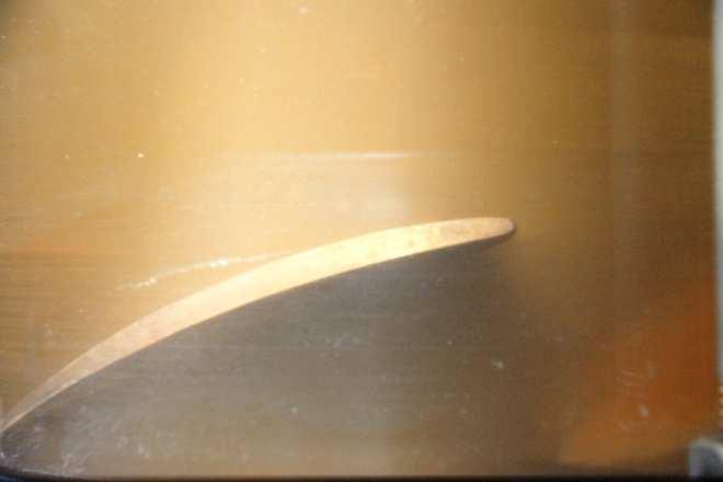 Figure 9 shows that by further reducing of the pump flow rate and increasing of the outlet pressure, tip vortex cavitation transforms to a cavitation phenomenon on the tip of the blade which is