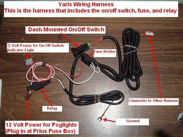 5. Using the wire harness shown above, I first clipped off the connectors on the white wire (labeled 12 Volt Power for Foglights ) and the red wire labeled (Connector to Other Harness) leaving about