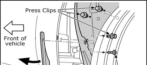 Fig. 15 14. RAISE VEHICLE ON HOIST 15. Begin on driver side of vehicle. Locate the lower cover panel under the front fascia in front of the wheels well. Remove three (3) T-20 Torx screws.