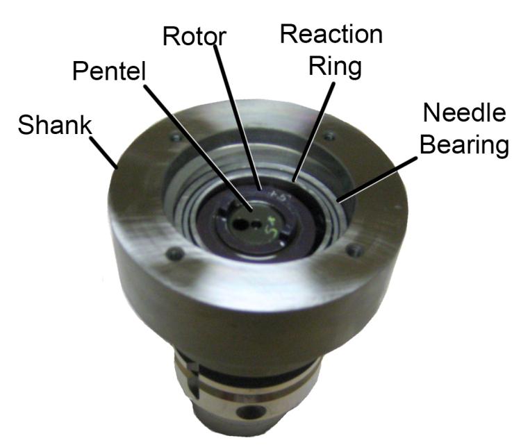 The ball pistons in the motor s rotor push against this ring as it slowly rotates. The ring is mounted in such a way that the balls do not ride on it symmetrically.