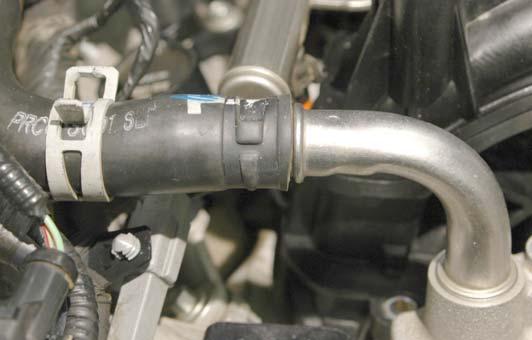 Connect the remaining end of the hose to the Fuel Pressure Sensor barb located on the