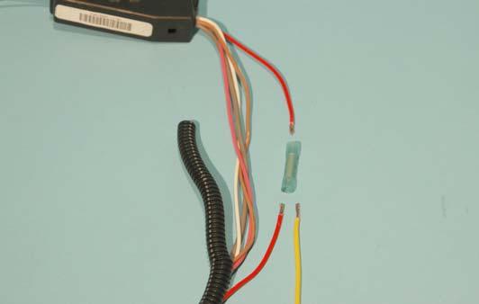 177. Locate the air conditioning relay box on the driver side inner fender well. Peel the tape and split-loom back from the harness as shown and locate the RED wire with the YELLOW stripe.