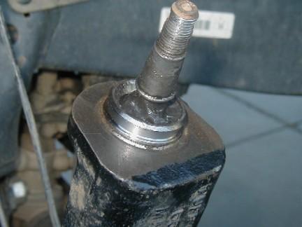 Remove retaining clip from ball joint. 7.