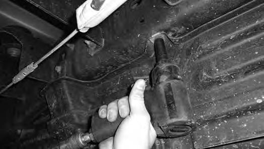 Note: DO NOT lower the fuel tank or remove the fuel tank straps. The installation can be done with the fuel tank still in the truck. FIGURE 6 17.