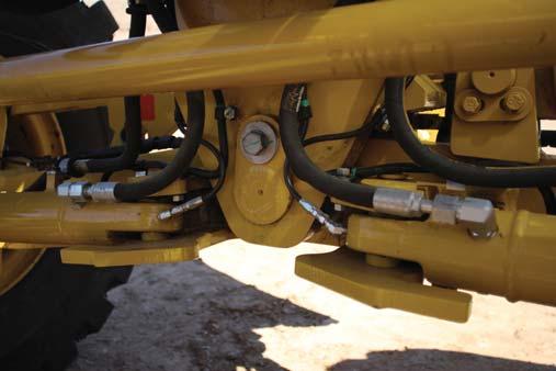 hydraulic hoses have been routed to improve reliability.