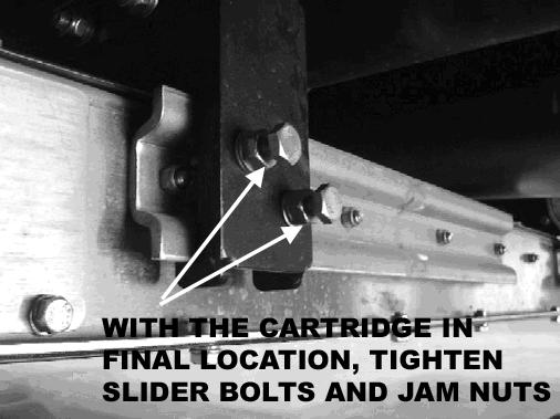 Gently tap on the black frame of each slide bracket to walk the lift enclosure forward or backward in the slide assembly.