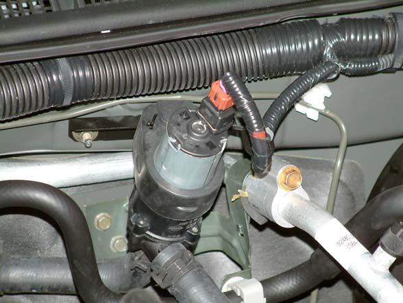 Heater Pump The 2004 Quest and 2005 Pathfinder now utilize a heater pump for ATC vehicles. The heater pump is located in the engine compartment near the bulkhead.