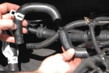 49. Cut the heater hose that went to the hard line on the driver side below the OEM manifold after the fi rst 90 bend