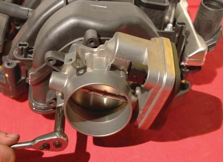 Remove the throttle body using a