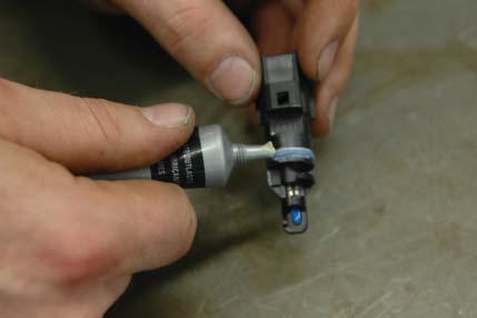 Lubricate the IAT sensor you just removed using the provided