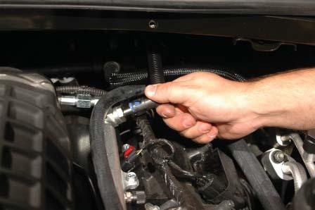Connect the fuel line to the supercharger fuel line barb at the rear driver side of the