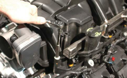 21. Remove the ten 8mm bolts holding the intake manifold to the