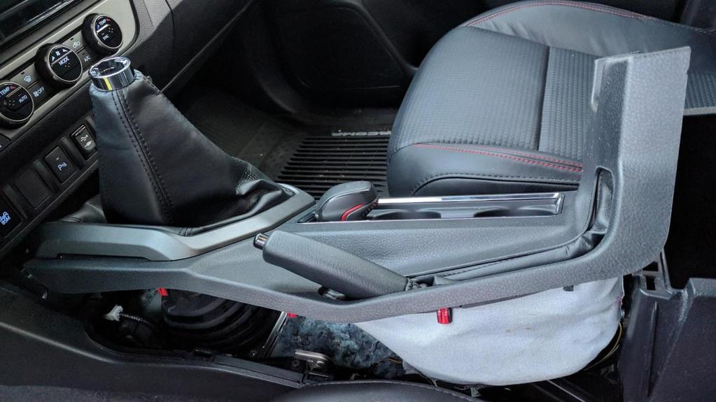 Now that the center console cover is completely removed, you can take