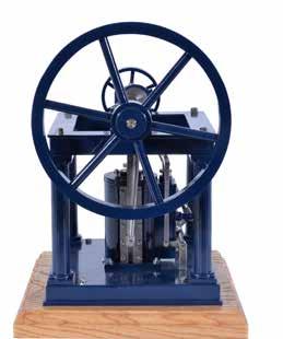 speed governor, brass oiler cups, steam inlet, spoked flywheel 22cm diameter and two small pulley wheels. The engine on shaped fabricated base with hardwood plinth 46cm x 27cm. Total height 30cm.