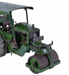 The model comes with a water bowser on spoked wheels with wooden block brakes, hand operated water pump and