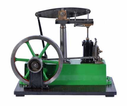 Model and full size stationary engines 57 A historic model of a live steam horizontal mill engine, the single cylinder lagged in planked hardwood with polished copper banding, steam valve mounted to