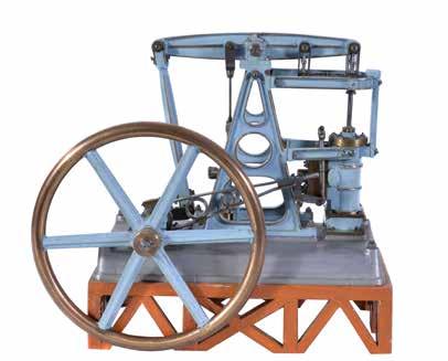pump linked to beam, steam control valve and spoked flywheel 22cm diameter, finished in light blue paintwork and supported on wood trestle plinth measuring 31cm x 18cm, overall 32cm high.