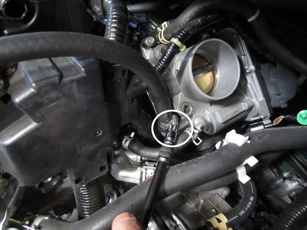 ag. Remove the coolant hose from the throttle