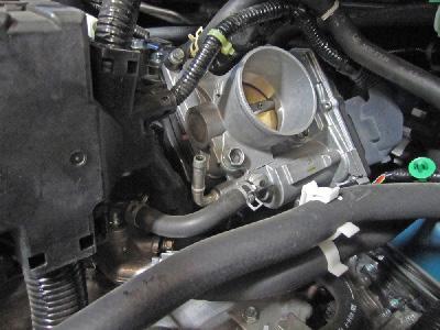 Install the provided 5/16 coolant hose and