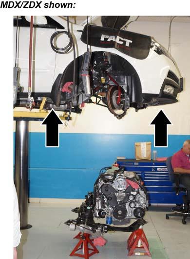 Set up four equal-sized jack stands (or equivalent equipment) under the vehicle s subframe immediate area. 49. Lower the vehicle until it is just above the jack stands. 50.
