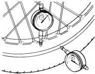 If properly tightening the spokes will not correct the runout, replace the wheel rim.