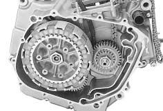 3-7 ENGINE CLUTCH With the primary drive gear held immovable using the special