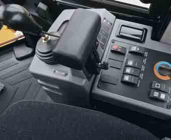 Right Side Console Steering System. The adjustable steering console lifts easily out of the way.
