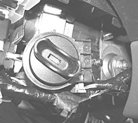 8 WIRE HARNESS CONNECTIONS- STEERING COLUMN 1. Route the immobilizer interface (previously installed) ribbon cable to the ignition switch, making sure to keep it away from any moving parts.