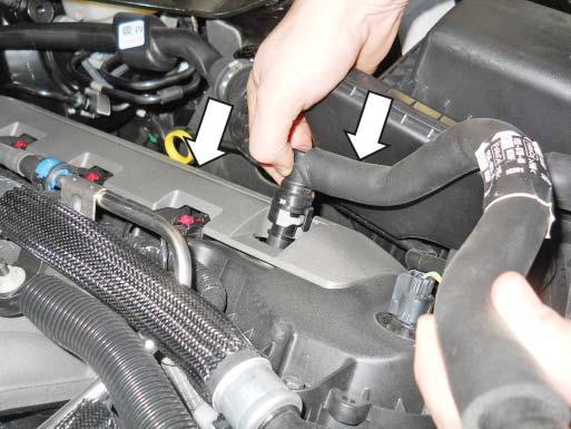 Disconnect the PCV Fresh Air Inlet tube from the left-hand cam cover and remove the tube from the vehicle. 18.