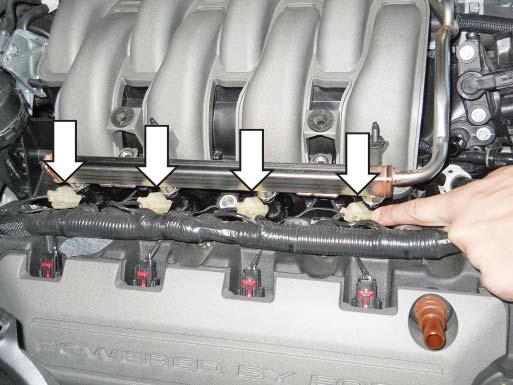 Remove the six (6) intake manifold mounting bolts. 39.