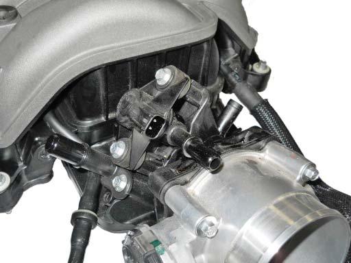 Remove the two (2) bolts and the Evaporative Emission Canister Purge Valve from the stock intake manifold (8 mm socket).