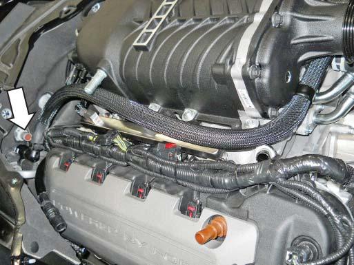 core. Remove the top intercooler tube bolt and install the P-clamp tab using the fastener on the