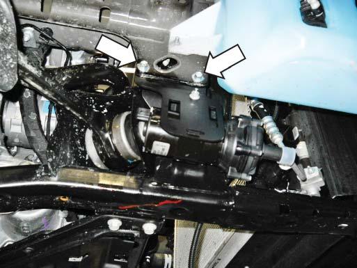 Place the intercooler pump assembly and bracket in mounting