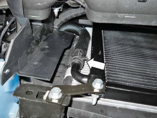 Install the intercooler pump outlet hose (1315-8K236) from the pump