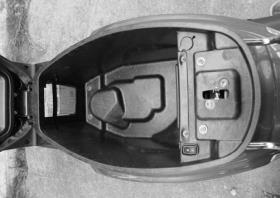 4-3 LOCK FOR STEERING HANDLEBAR Turn the steering handlebar to the far left prior to locking it. Turn the key to LOCK from OFF and remove key. Turn the key clockwise to unlock the steering handlebar.
