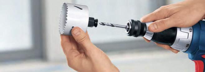 Tool-free insertion of pilot drill bit and holesaw into the quick-change adapter.