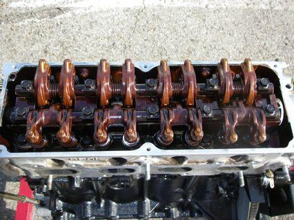 Step 12: Now you will remove the rocker arm assemblies an the camshaft.