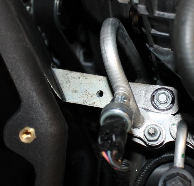 Remove the stock air box mounting grommets and install the supplied u-nuts