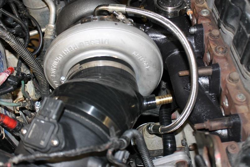 Install the intake boot (1405416) onto the turbo ensuring the boot nipple is on the bottom side closest to the turbo