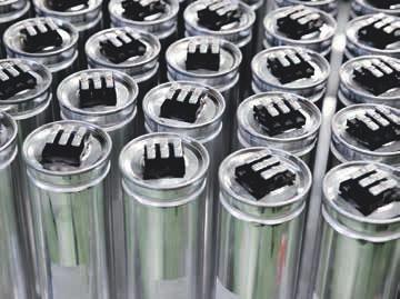 7 Capacitor manufacturing 7a QCap capacitors 7b On the production line ABB s QCap capacitor breaks new ground in terms of reliability, quality and safety. lid rises due to gas pressure.