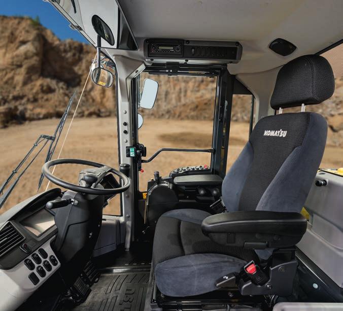 First-Class Comfort Increased comfort In the wide Komatsu SpaceCab, a standard air-suspended high-back seat, heated for improved comfort and with fully adjustable armrests, is the centre of a